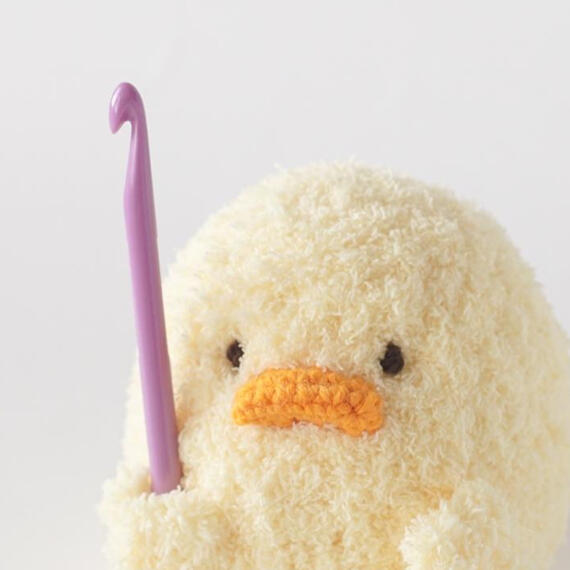 Fuzzy chick with crochet hook